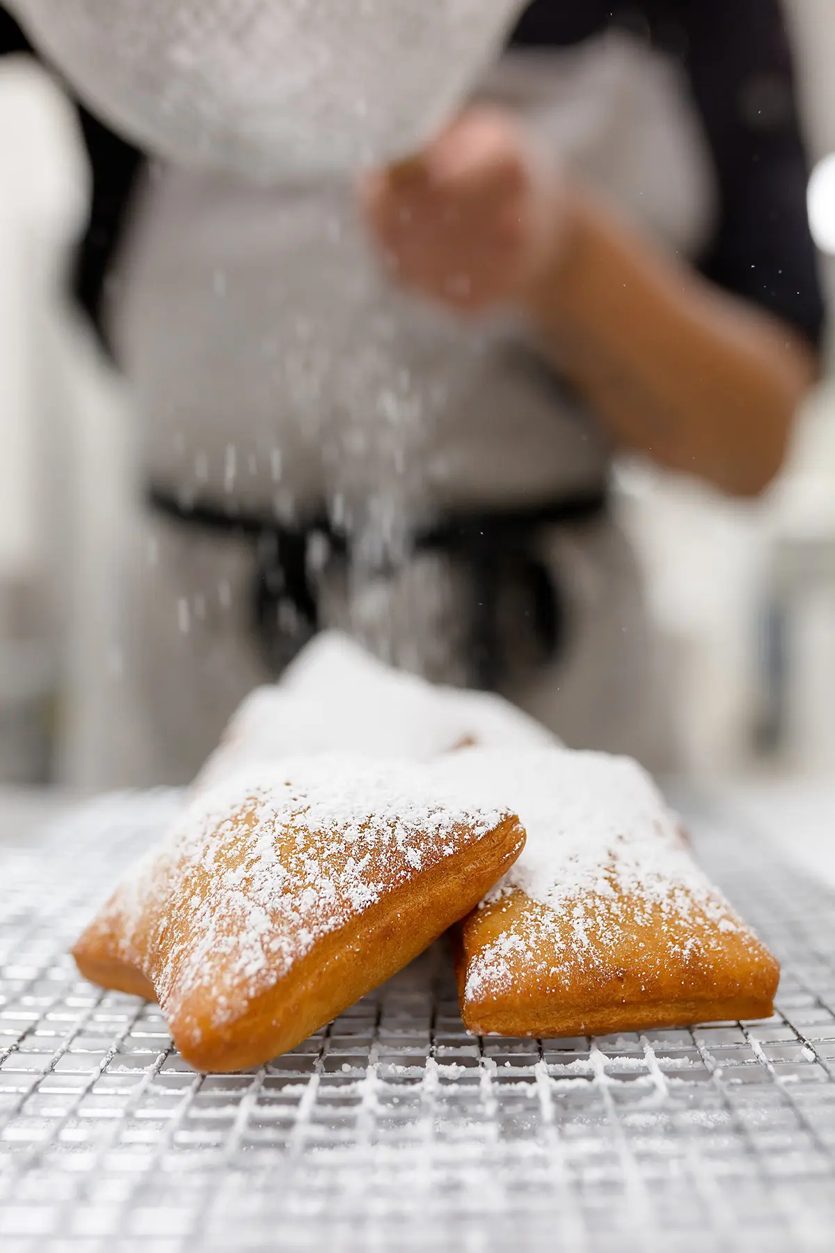Their specialty is handmade deep-fried beignets and they source White Rock Coffee. Courtesy of Le Bon Temps