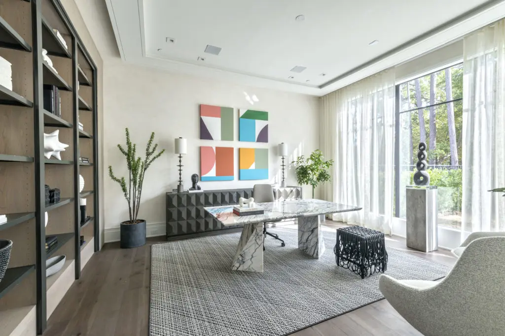 The size of this home office dictated a spectacular work space, here provided by a Cantoni dining table. (Photo by Jeff Myers Photography)