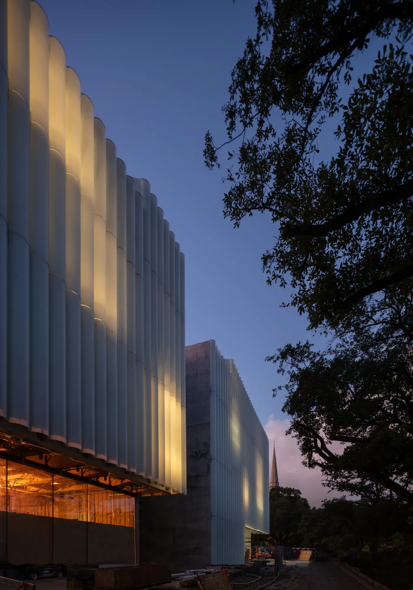 Evening view of glass tubing on the east facade of the MFAH's upcoming Nancy and Rich Kinder Building. (Photo © Richard Barnes)