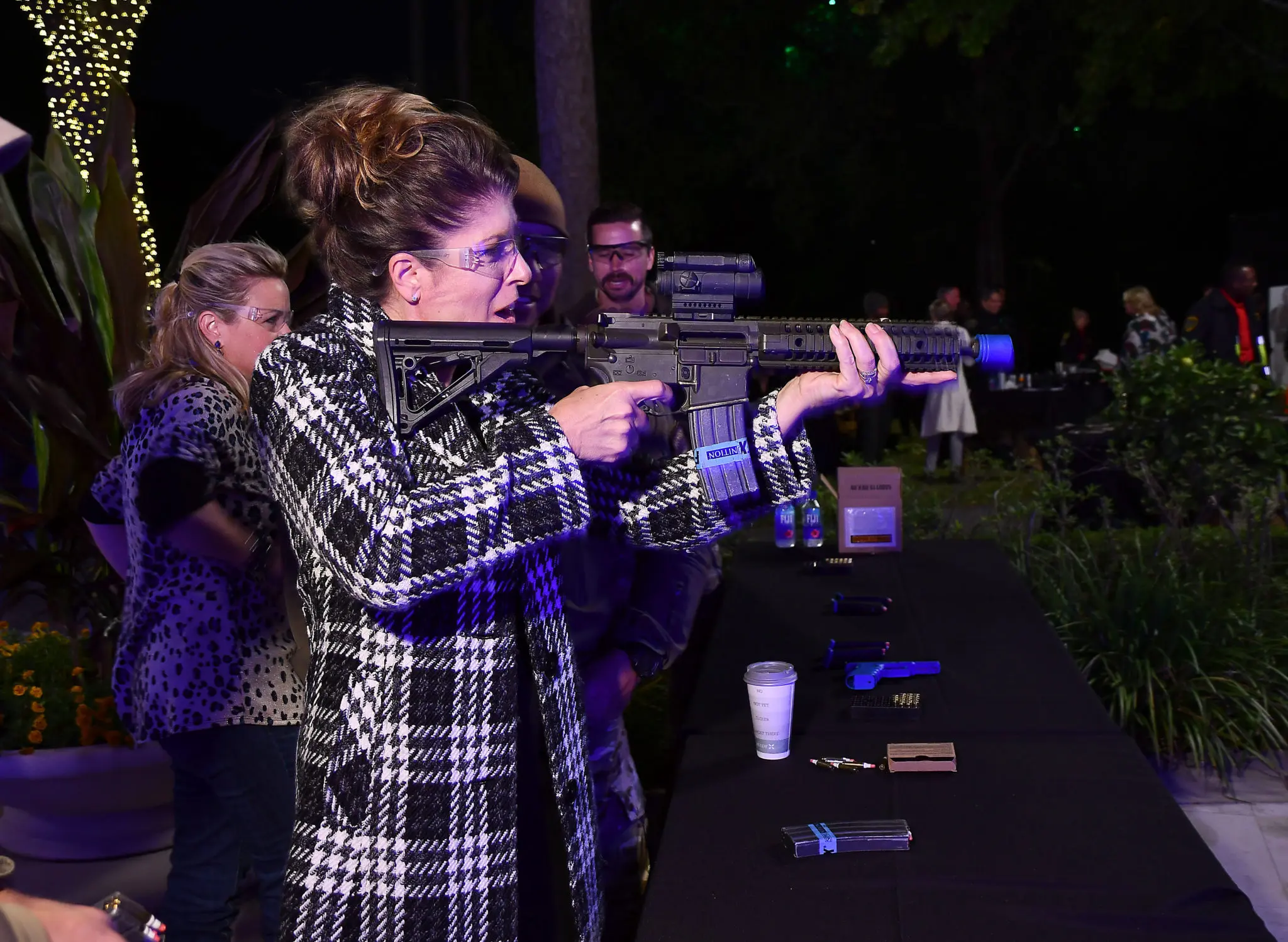 Brenda Touchstone tries her luck at the range. (Dave Rossman photo)