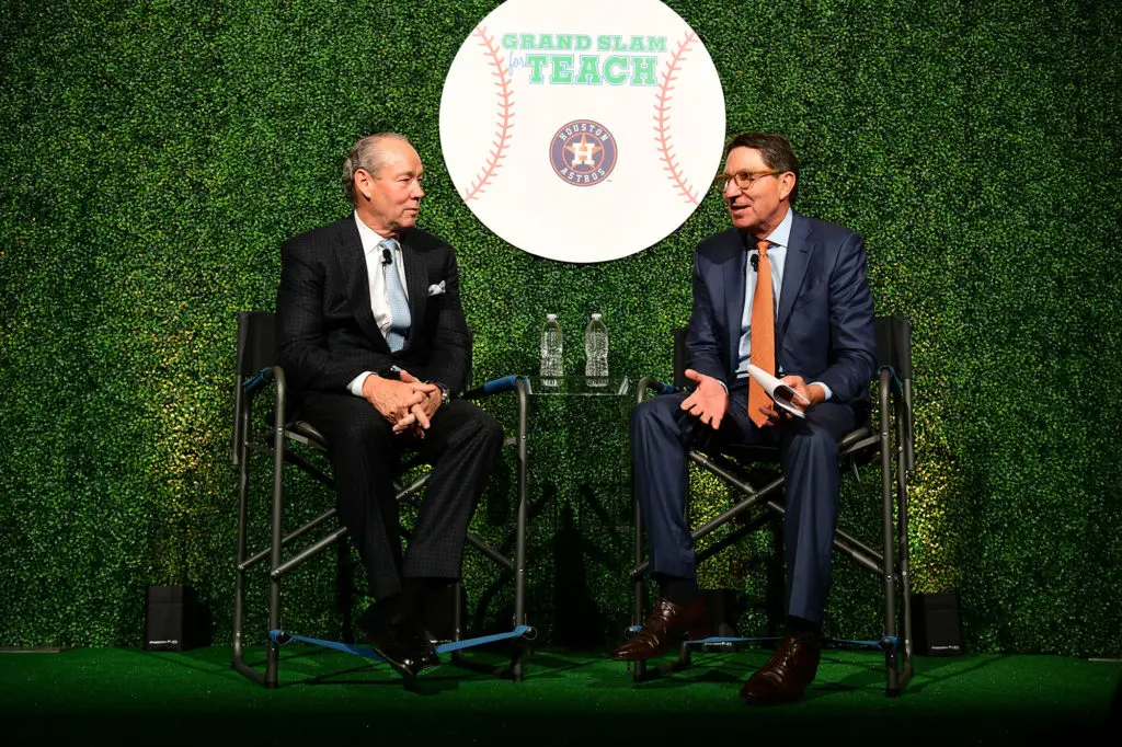 Jim Crane, Scott McClelland provide an entertaining exchange on stage at River Oaks Country Club at the 2019 Touchdown for TEACH evening. (Photo by Daniel Ortiz)