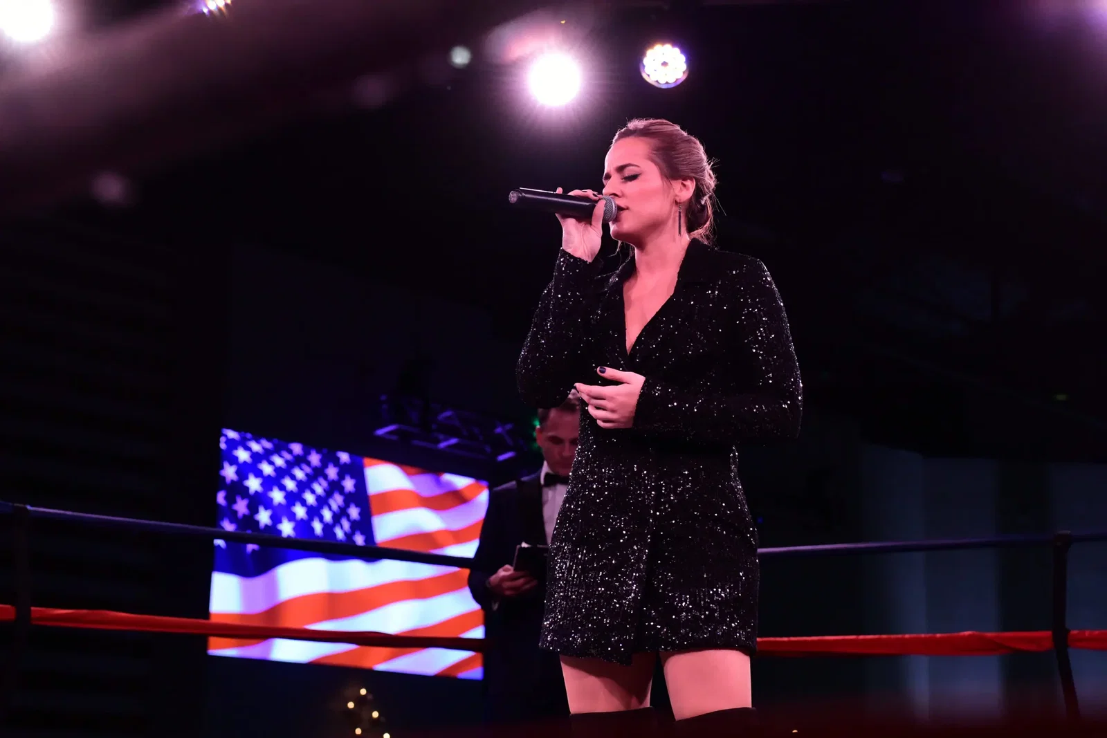 Mary Sarah of The Voice fame sings the National Antham at Black Tie Boxing. (Photo by Daniel Ortiz)