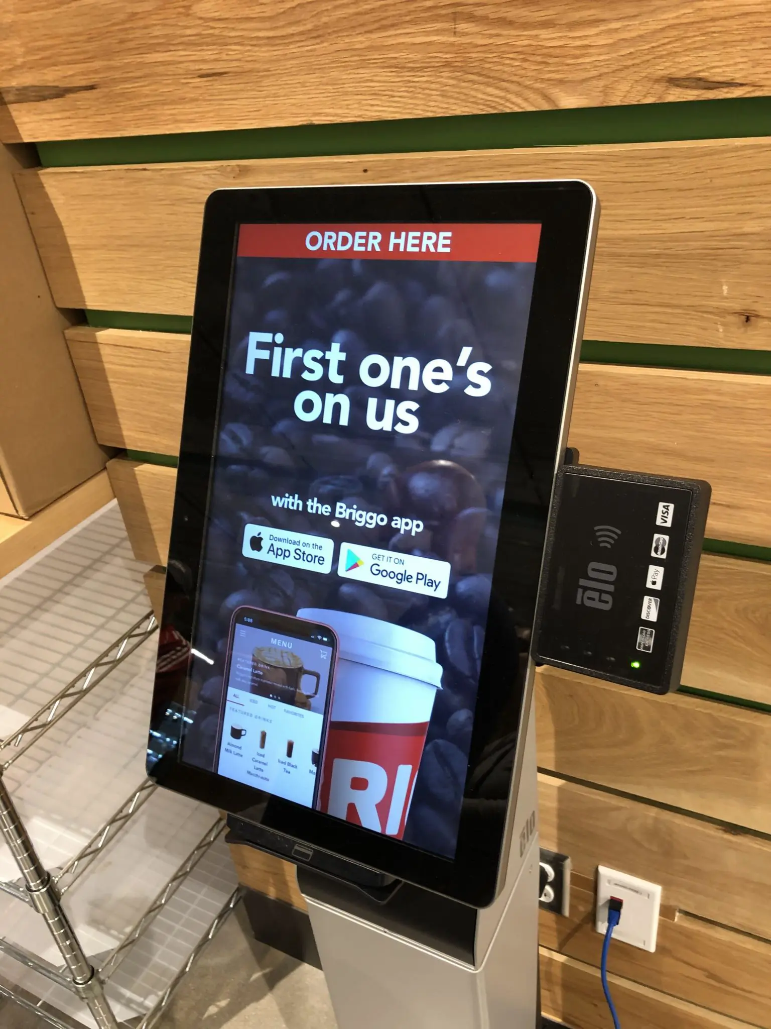 The Midtown store features Briggo, an Austin-based company that offers hot and iced coffees and teas, seasonal beverages, and specialty drinks ordered with a mobile app and made in a robotic Coffee Haus. (Photo by Chad Miller)
