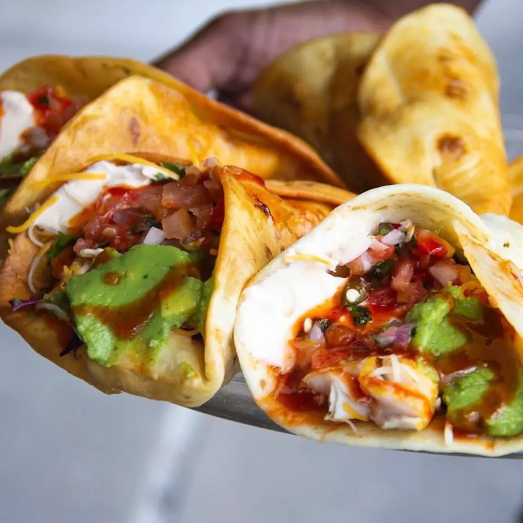 The tacos at Trill come with all kinds of savory sauces. 