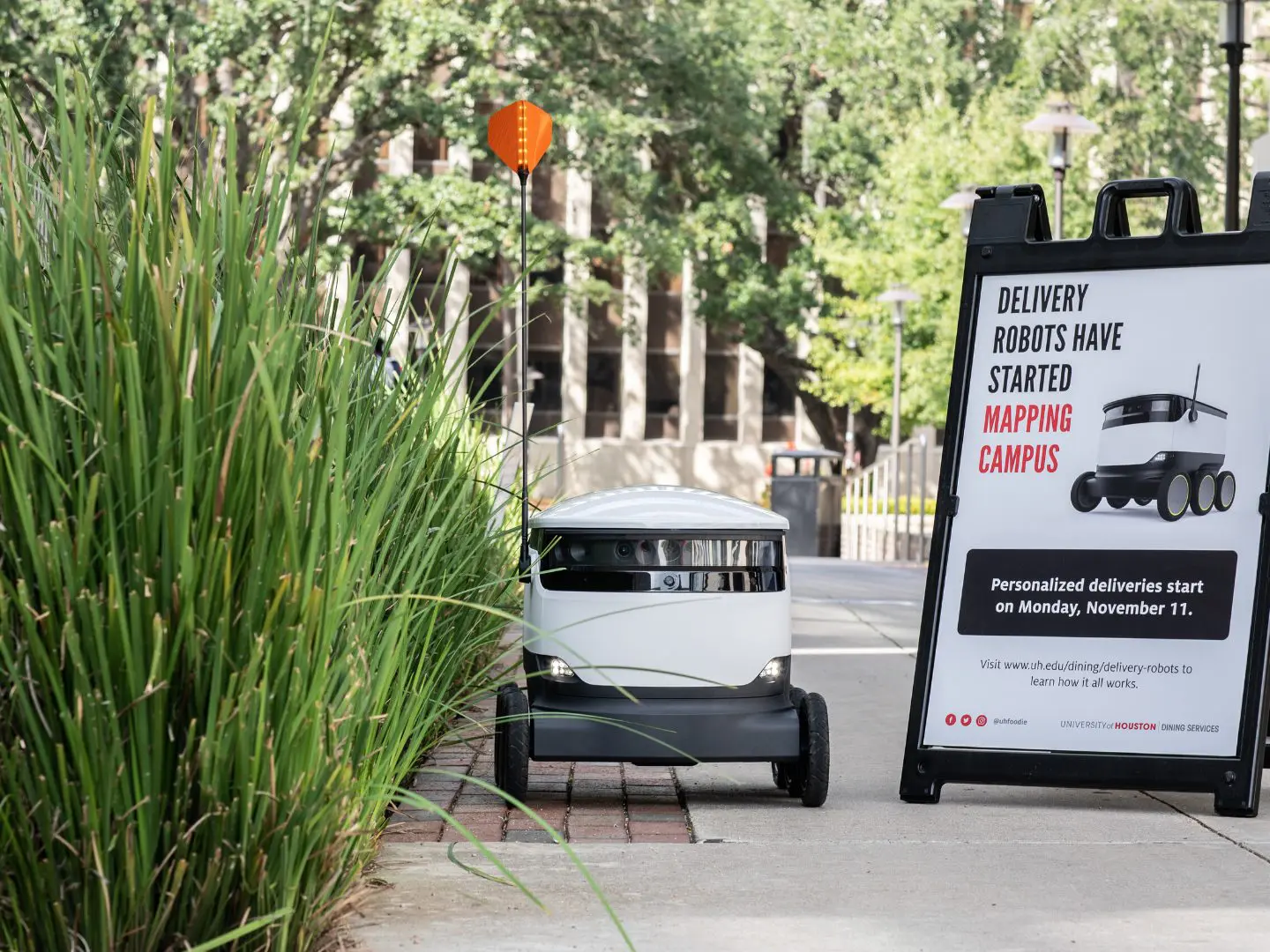 The food delivery robots move around UH's campus on their own.