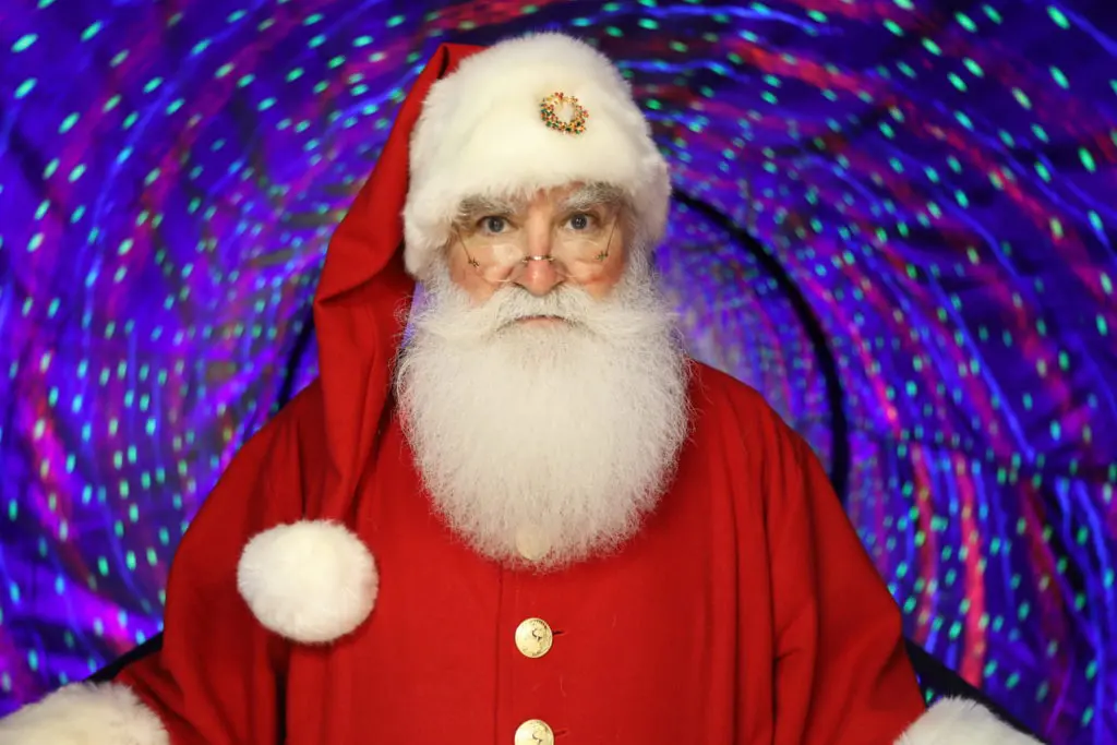 Santa is coming to take photos at the Museum of Illusions this season. 
