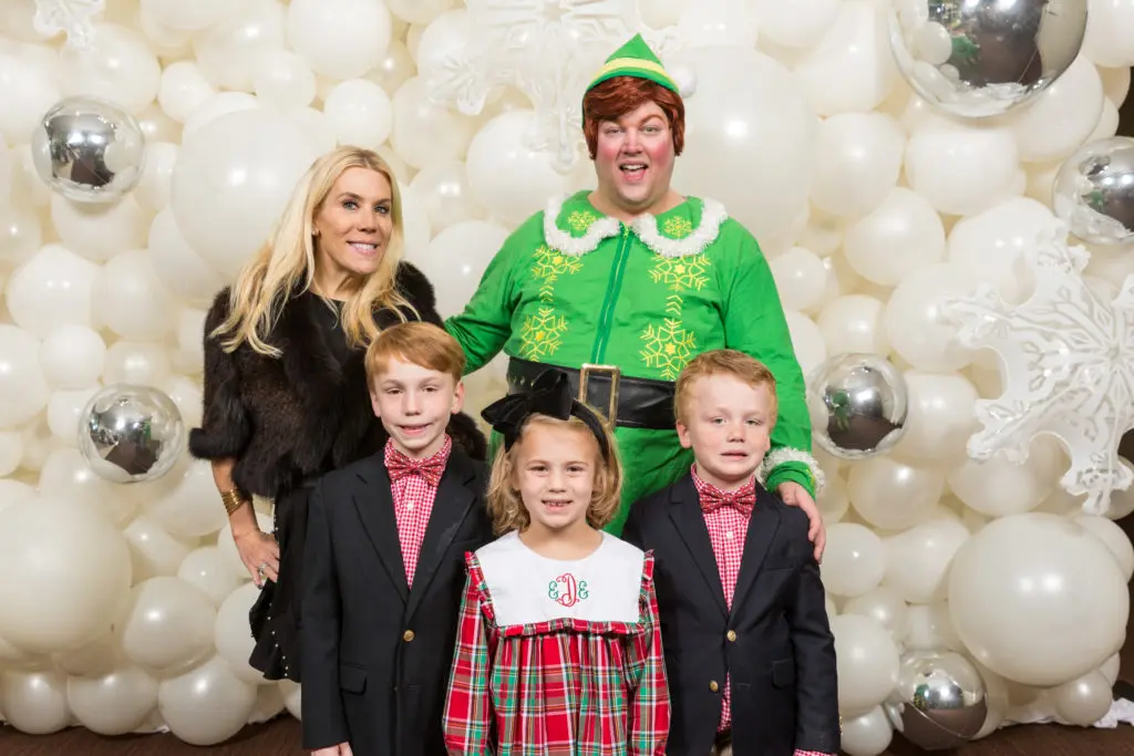 Deneige Dooley with her children and Buddy The Elf (Photo by 713 Photography)