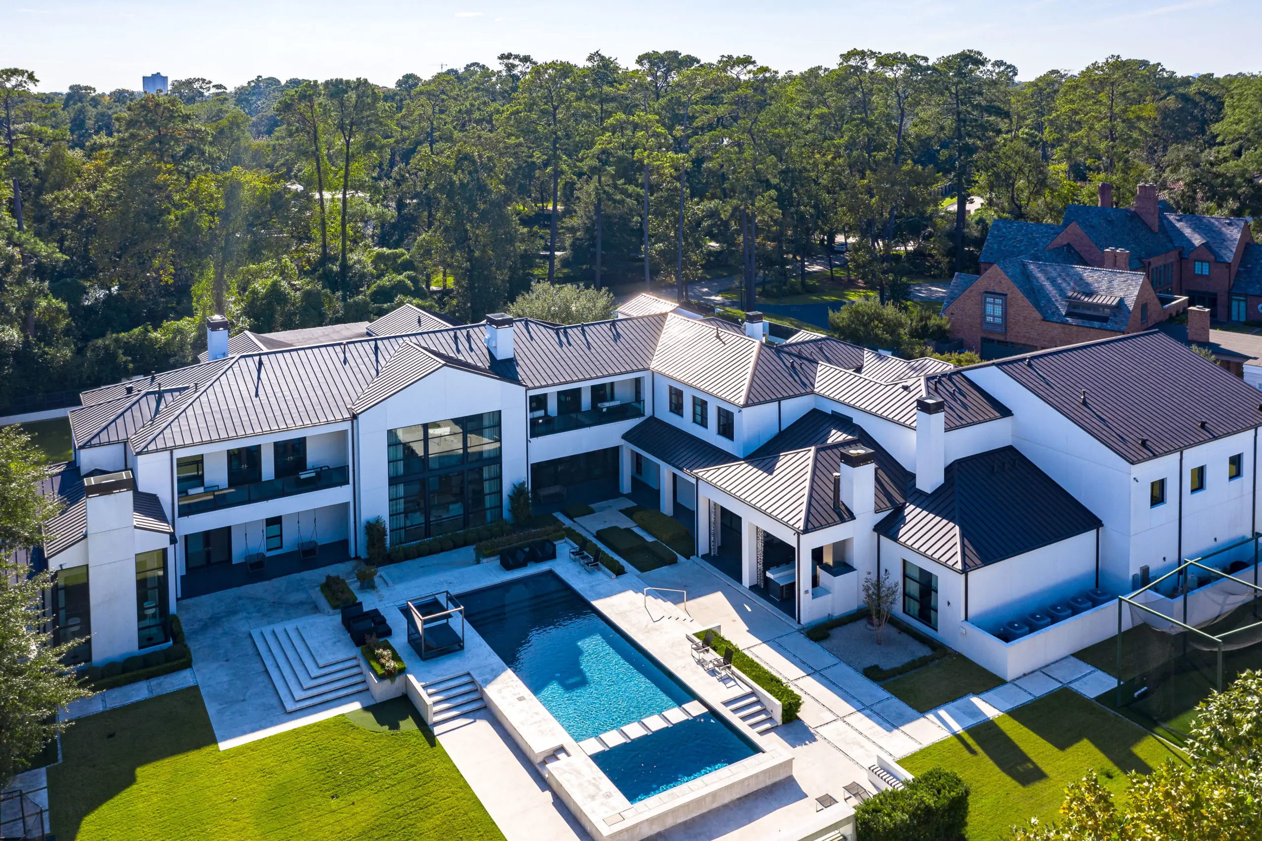 A sky high view the property reveals the vastness of the home. (Photo by DroneHub Media)