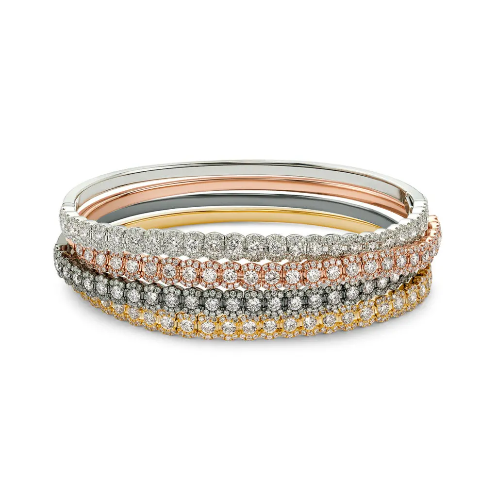 Posh Stackable Bracelets featuring diamonds in 18K black, white, rose and yellow gold.