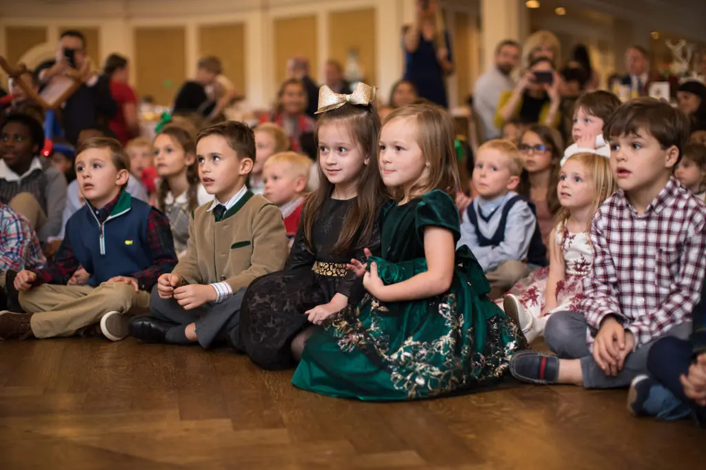 Children in their Sunday best are mesmerized by the performance of Houston Symphony musicians. (Photo by Leah Wilson)