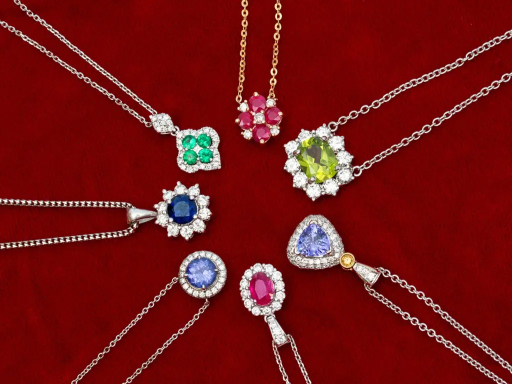 A selection of modern and vintage gemstone and diamond pendant