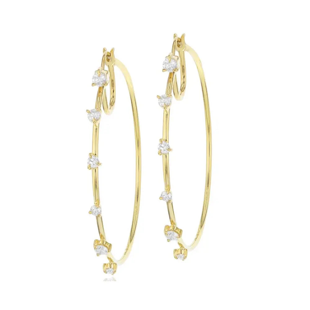 Phillips House 14k yellow gold rhodium plated Enchanted front closed hoop earrings.
