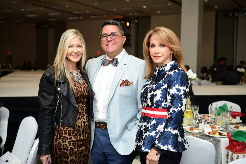 Patti Murphy, Dr. Roland Maldonado, Kari Parsons at the Saks Fifth Avenue fashion show and luncheon (Photo by Daniel Ortiz)