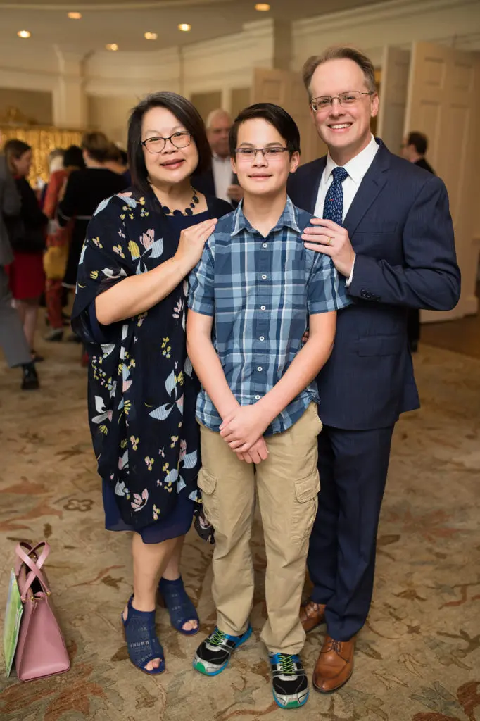 Regina and John Mangum with their son John (Photo by Leah Wilson)