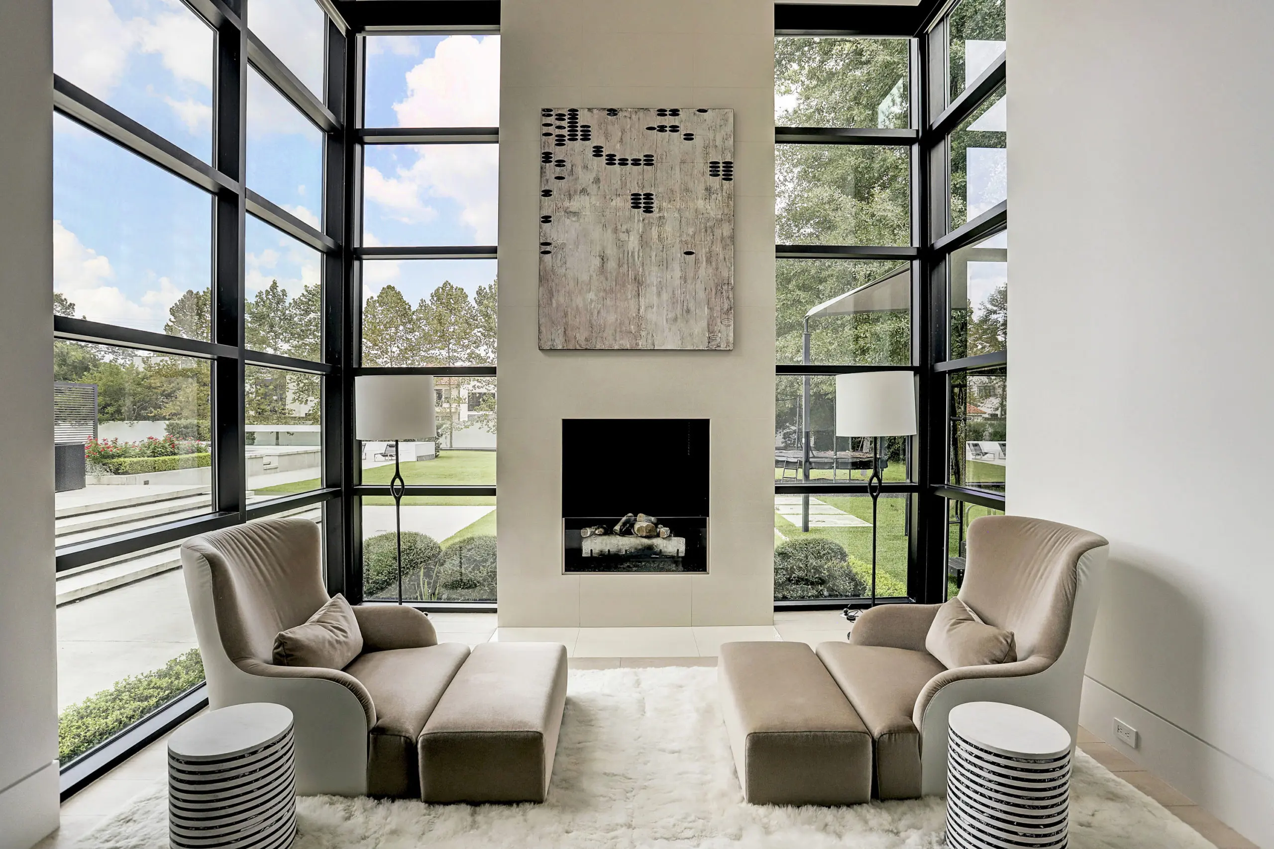 The sitting area in the master suite features an electric fireplace. (Photo by TK Images)