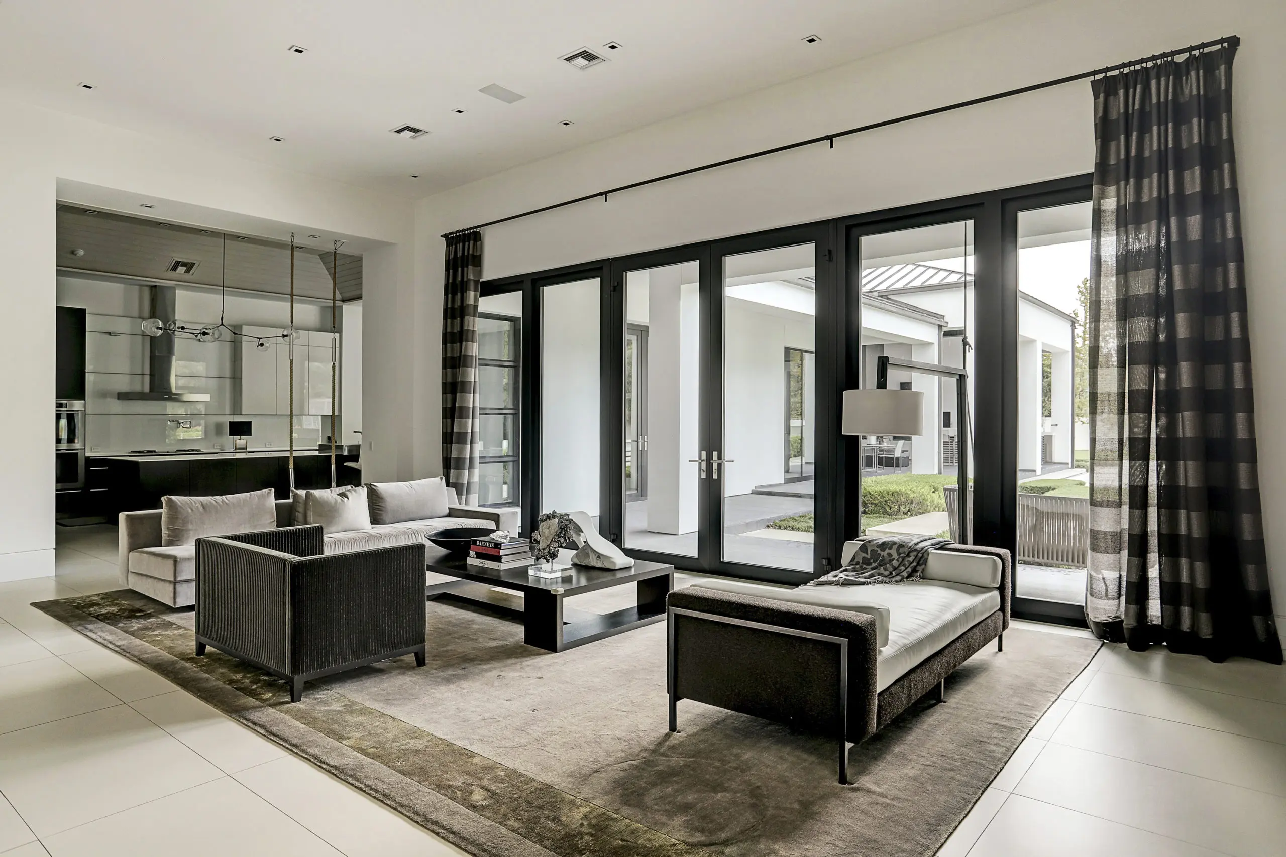 The family room opens directly to the loggia and swimming pool. (Photo by TK Images)