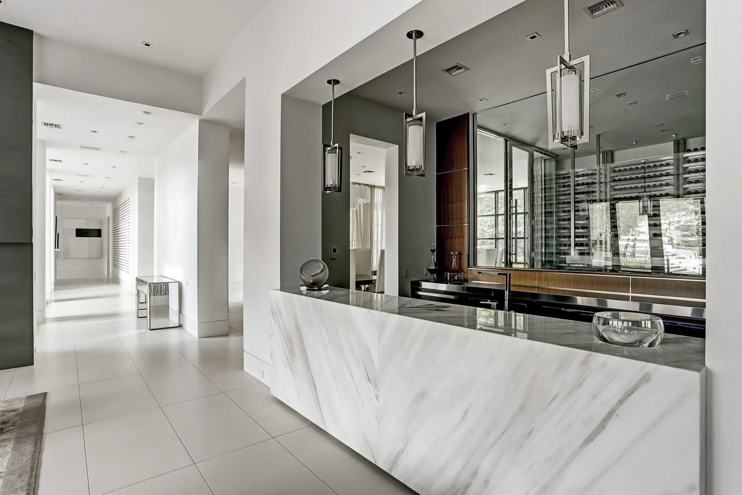 The 10-foot bar is carved from Carrera marble.