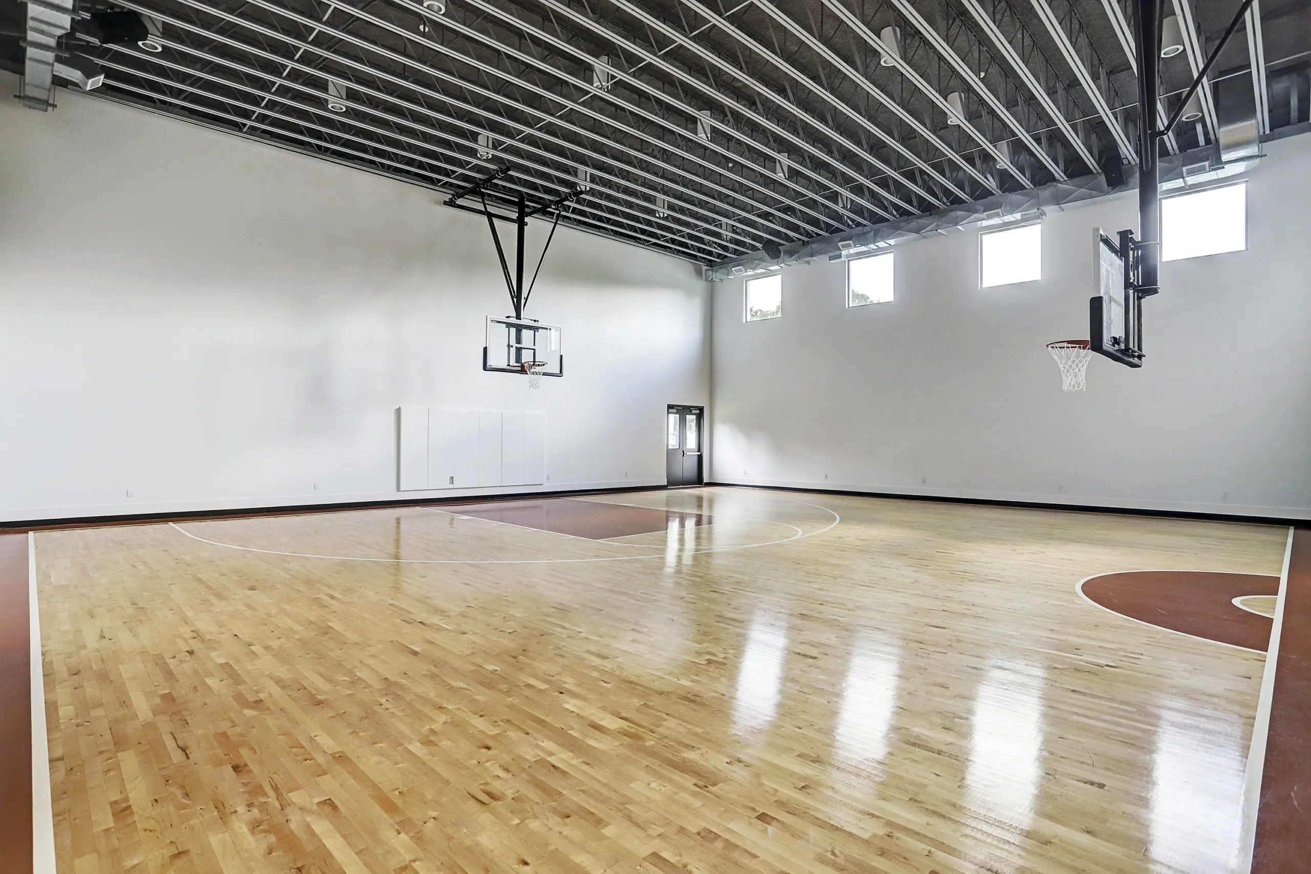 The half-size basketball court is a special feature of the home at 9030 
Sandringham. (Photo by TK Images)