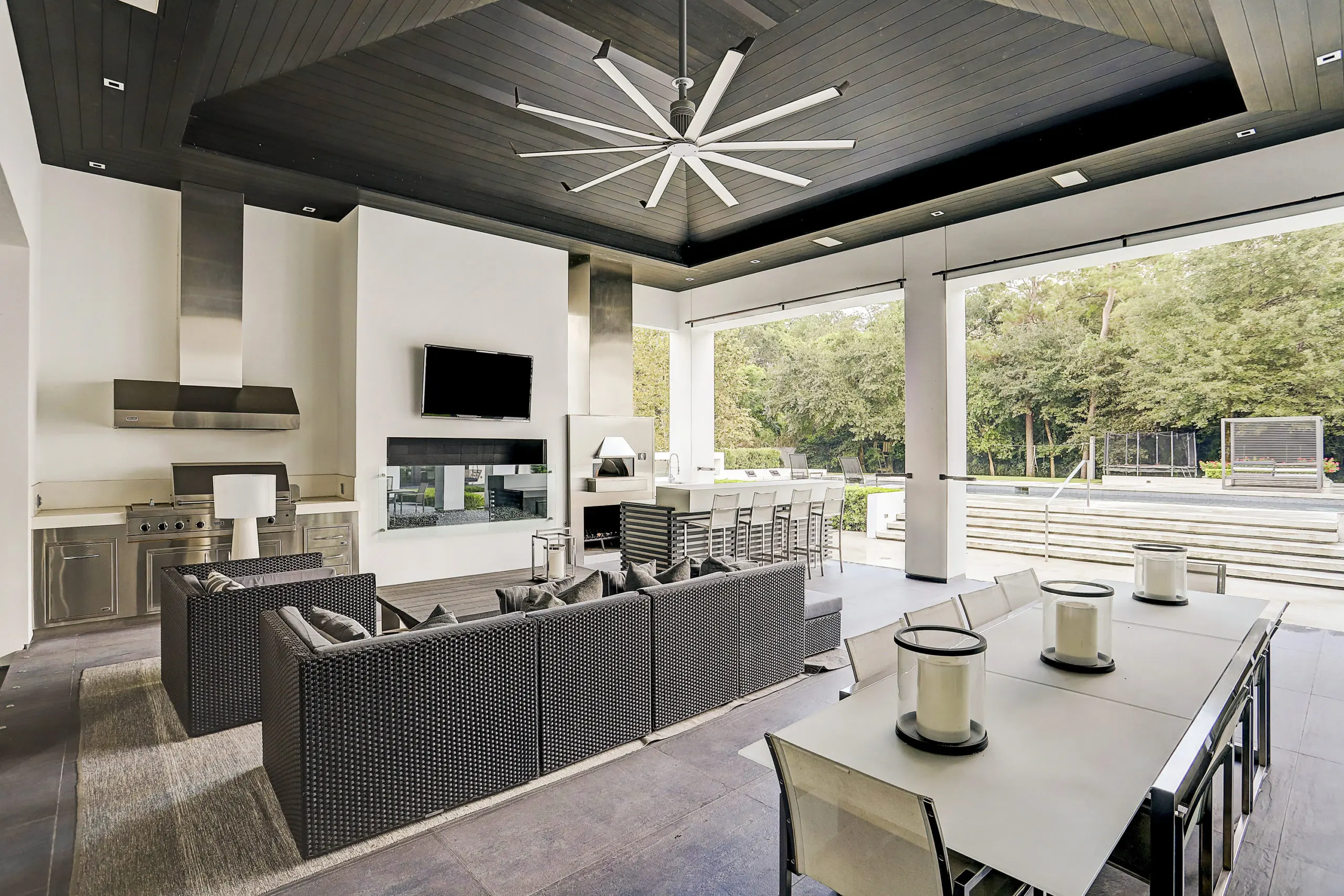 The covered loggia includes a fireplace, grill and wood-burning pizza oven. (Photo by TK Images)