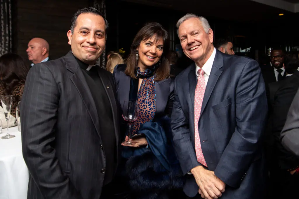 The Rev. Juan Torres, Terri & John Havens (Photo by Michelle Watson/CatchlightGroup.com)