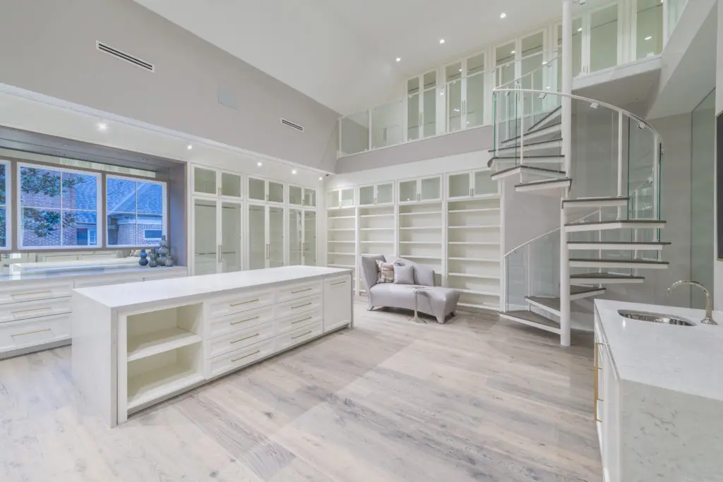 The two-story master wardrobe in the home at 2511 Del Monte pulls inspiration from the Chanel boutique in New York. It is listed with Compass agent DeeDee Guggenheim Howes. 