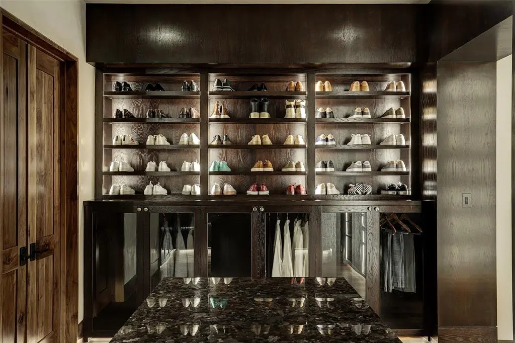 Shoes get special attention in this closet at 9111 Memorial, listed with DeeDee Guggenheim Howes at Compass.