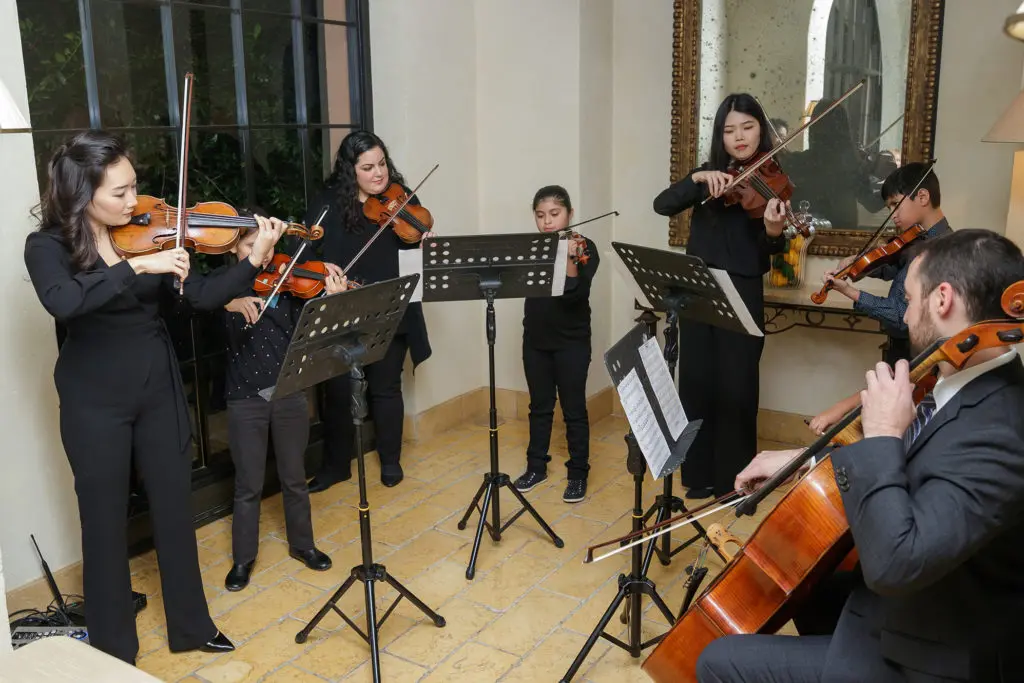 Dallas Symphony Orchestra and the young musicians' program performing "Autumn" from Vivaldi's "Four Seasons." (Photo by WJN Photo)