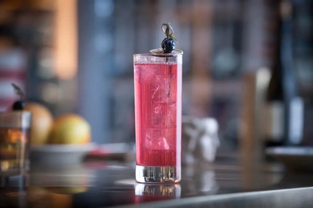 A mix of Tito's, hibiscus, lime and soda, Lex's Buzz is a must-try drink. (Photo by Manny Images)