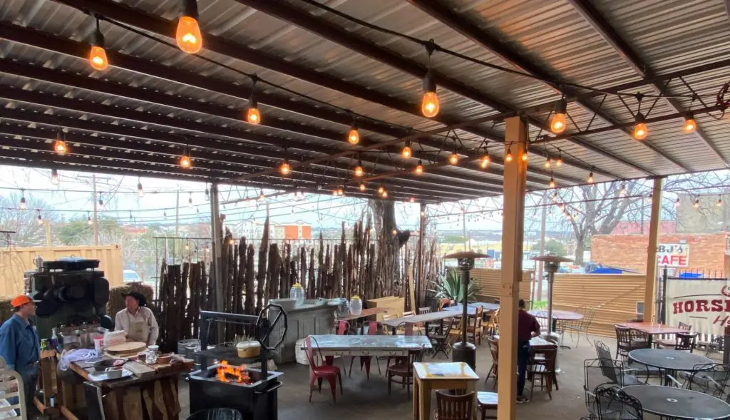The rustic and casual patio at The Brand Room.