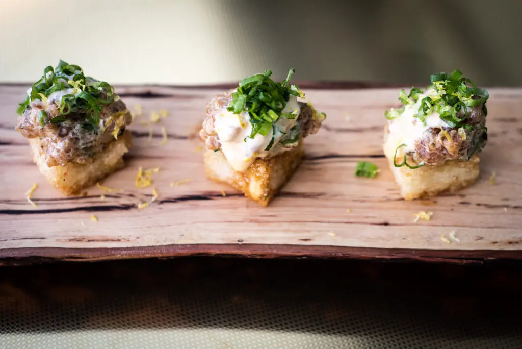 Tuna tartare comes with crispy rice and miso dressing. Courtesy of Foxyco