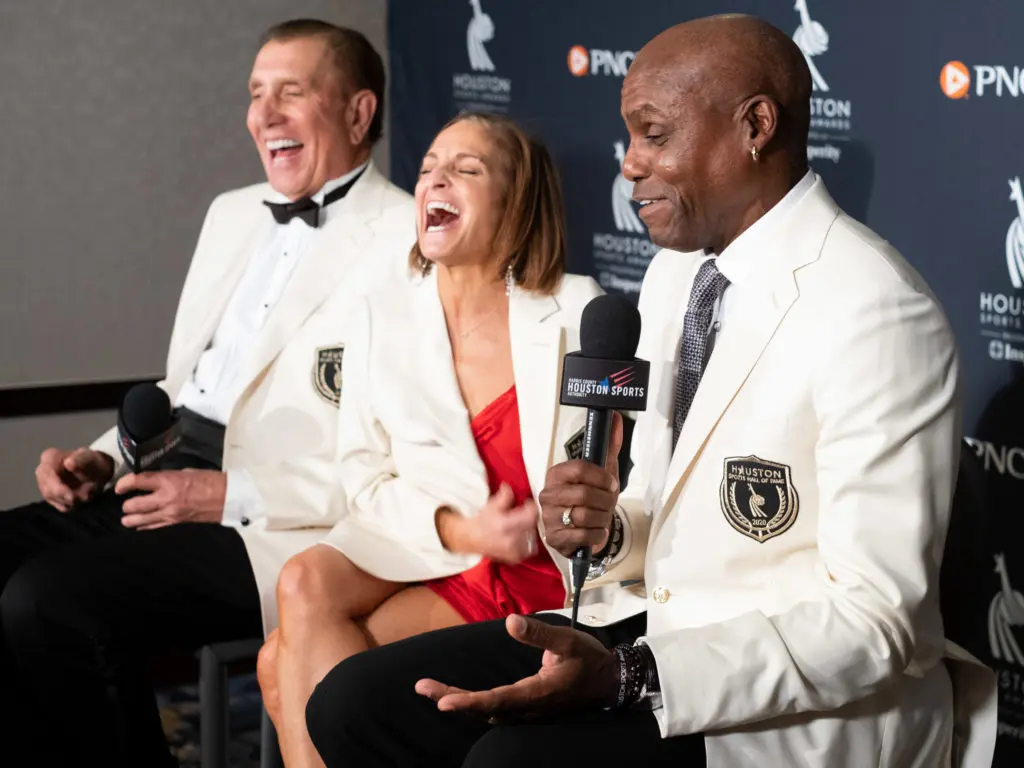 Rudy Tomjanovich, Mary Lou Retton and Carl Lewis went into the Houston Sports Hall of Fame together. (Photo by F. Carter Smith)