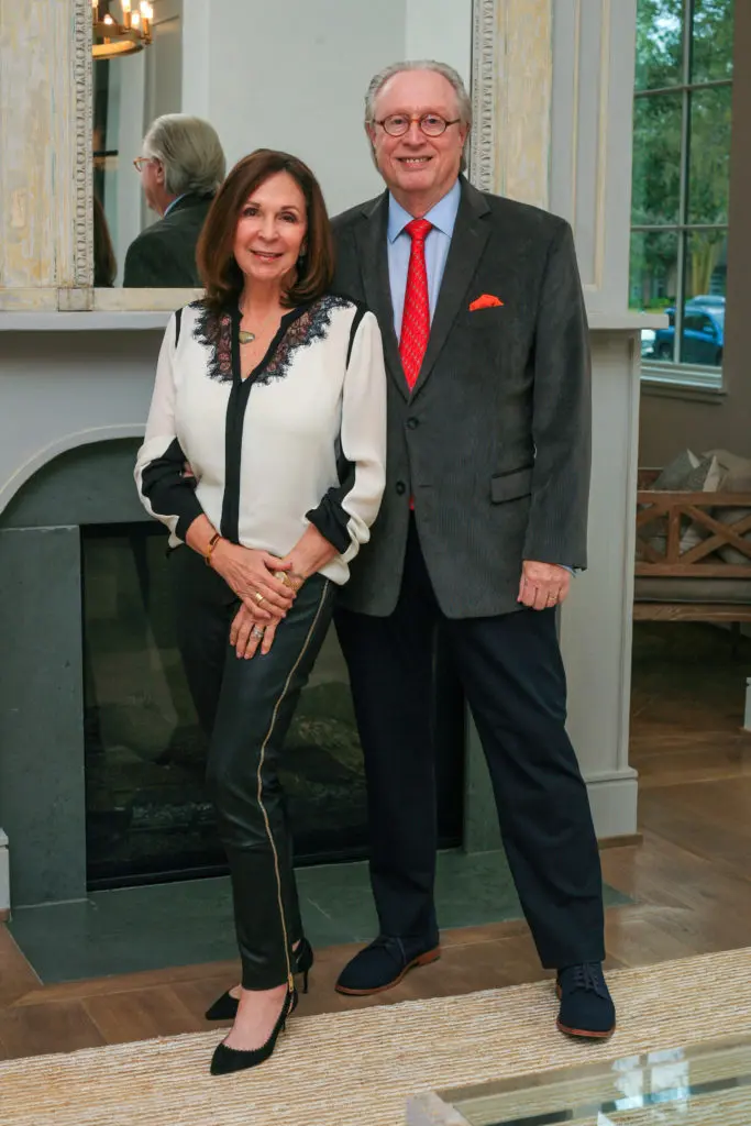 Architects Maria & George Tracy join the open house party, glowing in the praise for their design. (Photo by Chris Bachman)