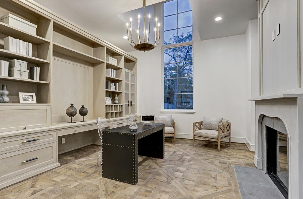 The study opens to the living room which opens to the foyer and dining room, an open floor plan without apologies. (Photo by TK Images)