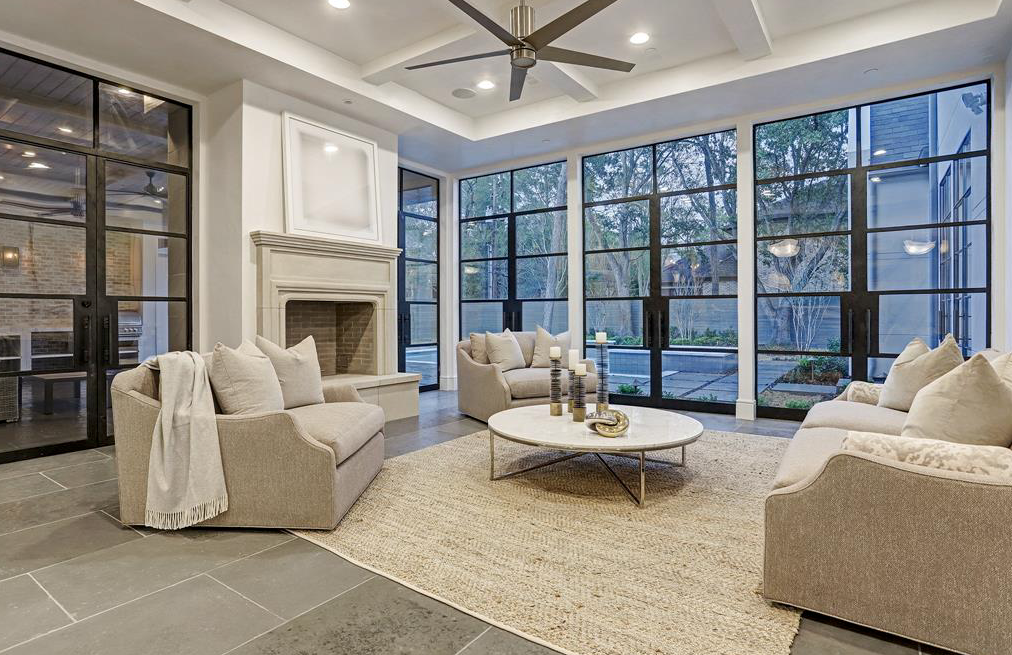 The family room overlooks the swimming pool. (Photo by TK Images)