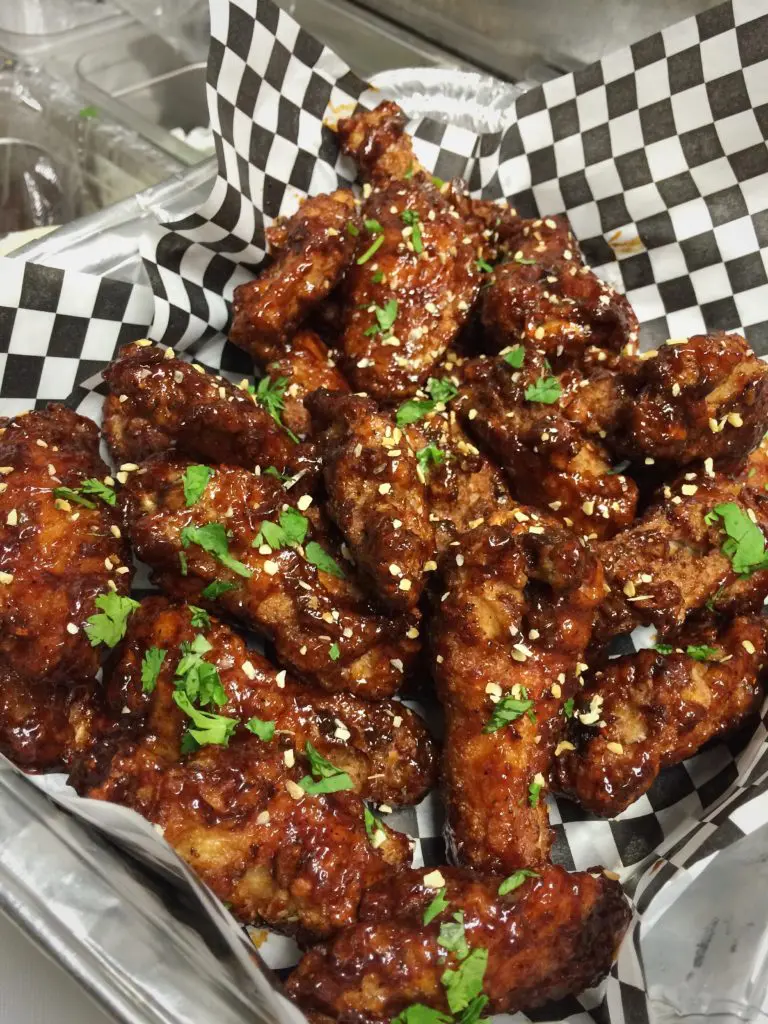 Sticky's Wings are the signature dish, perfected by Ceferino Vivares.