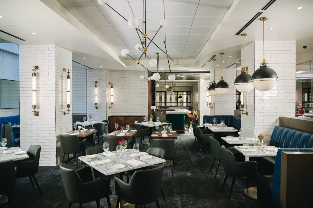 The Longhorn dining room with stocked wine room in the distance.
