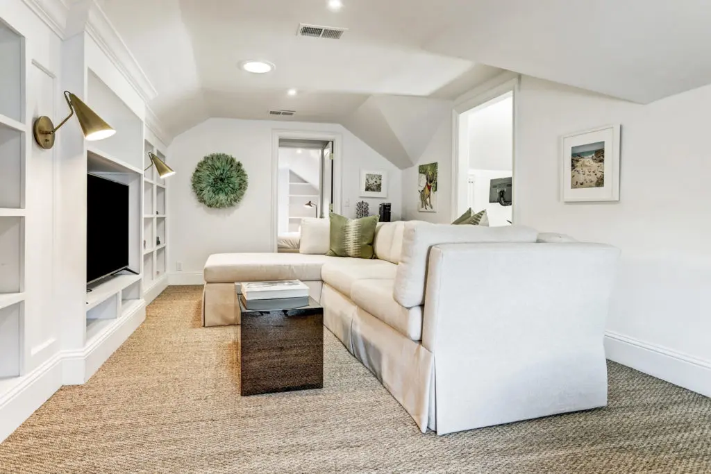 The third floor TV lounge provides a cozy area for casual entertaining. (Photo by TK Images)
