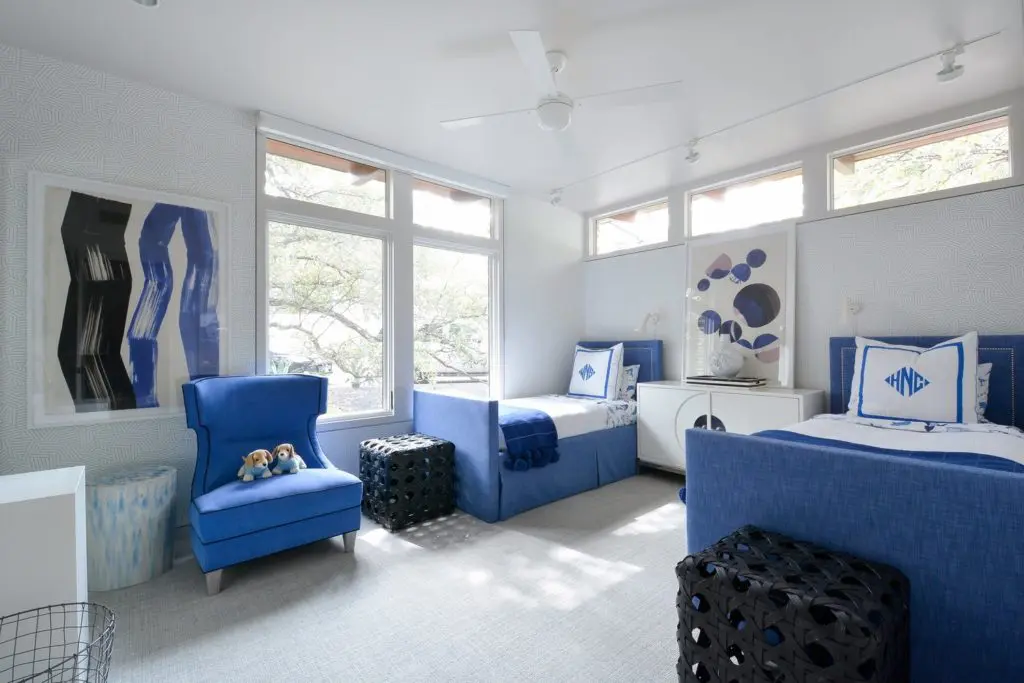 The twins bedroom reflects a sophisticated yet inviting ambience.