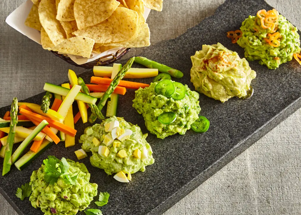 Choose three of five guacs with AvoEatery's guacamole flight.