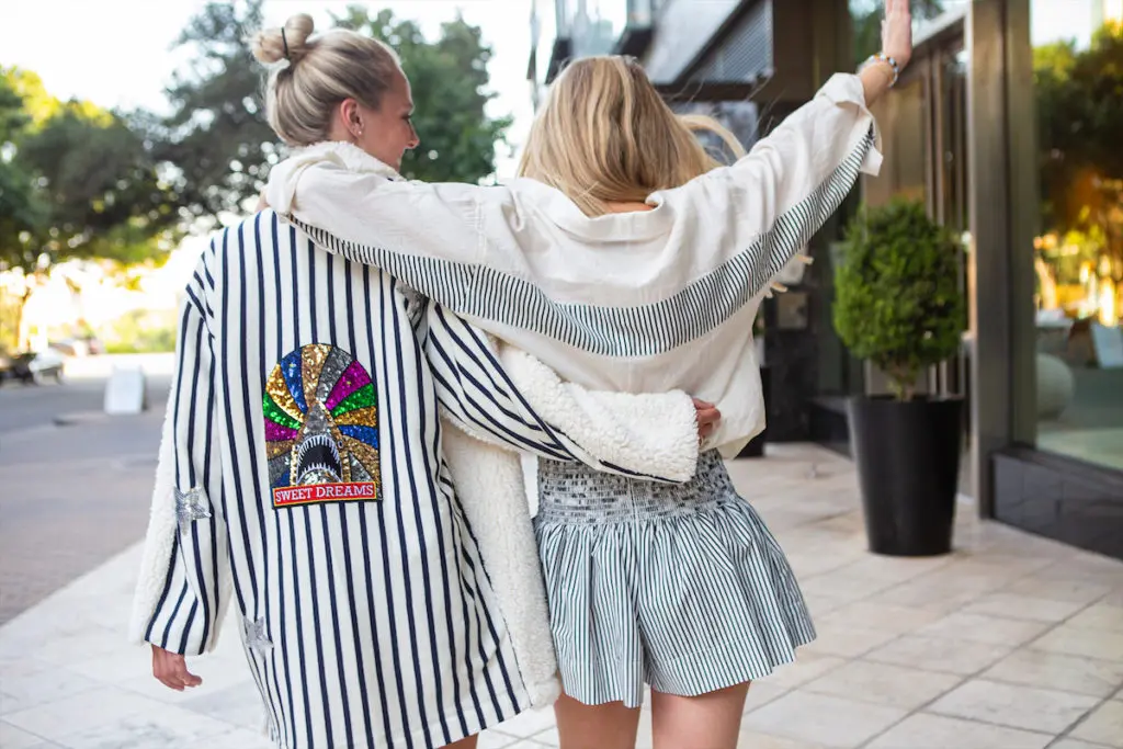 Designer Nicole Musselman's Koch just launched a spring break capsule collection, filled with parrot prints, citrus hues, and a very important yellow skirt situation. (Photo by courtesy of Koch )