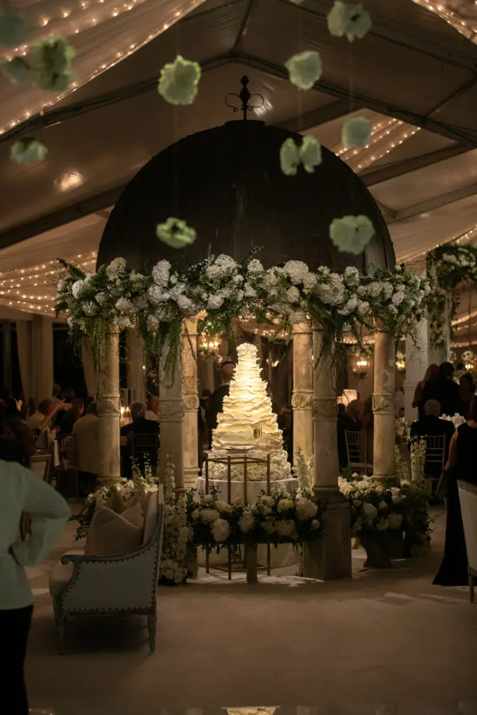 The wedding cake gets the spotlight in the Schlegel's gazebo. (Photo by John Cain)