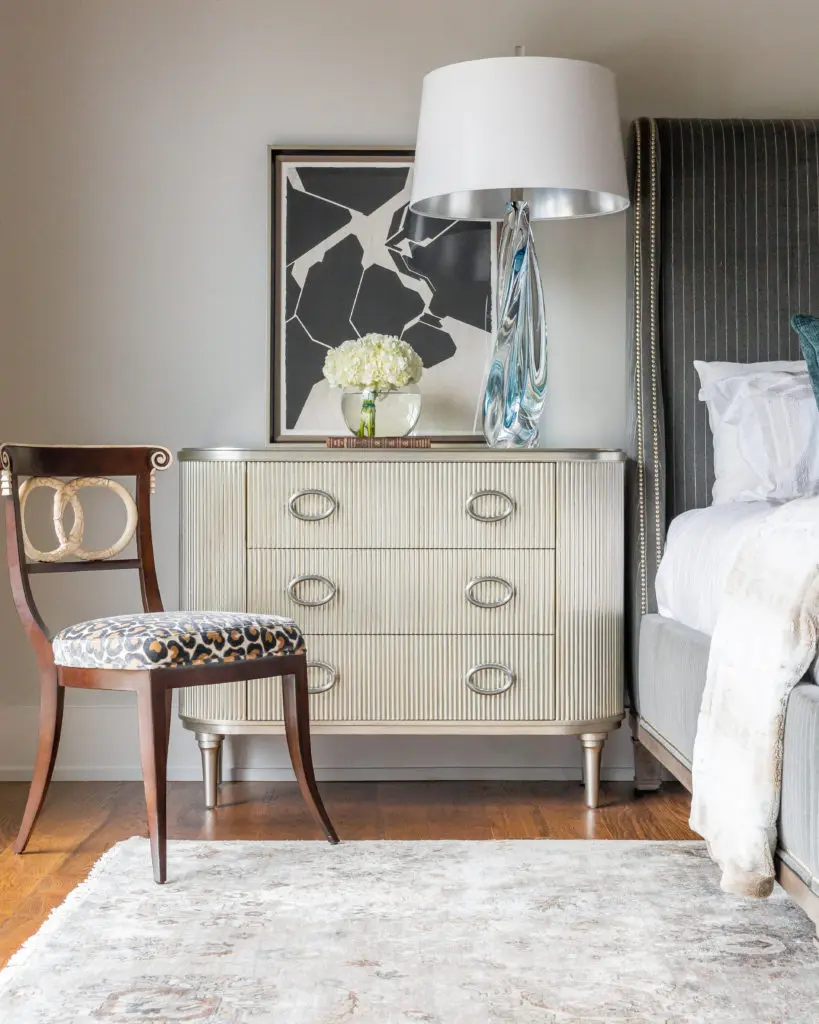 The three-drawer chest is from Ambella Home as well as the custom Dolphin chair with ocelot print. (Photo by Jen Burner)
