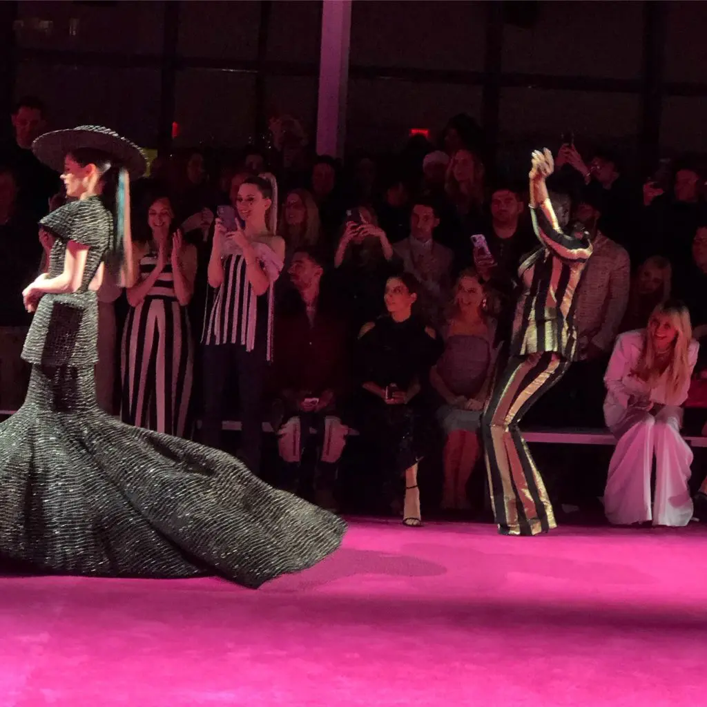 Leslie Jones whoops it up at the Christian Siriano runway show. (Photo by Clifford Pugh)