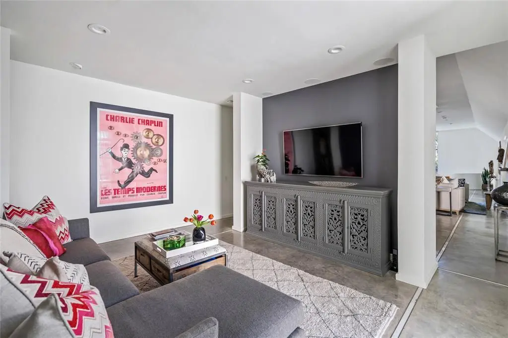 Custom concrete floors are found throughout the majority of the Ron Wommack-designed home. (Photo by Briggs Freeman Sotheby's)