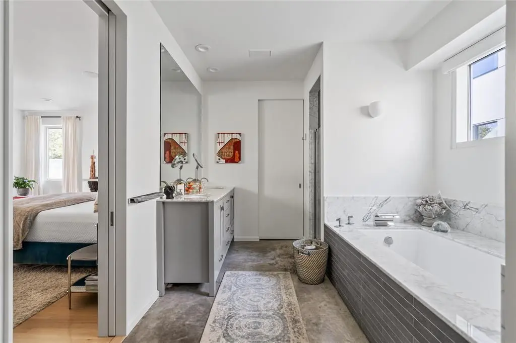 A marble-filled bathroom. (Photo by Briggs Freeman Sotheby's)
