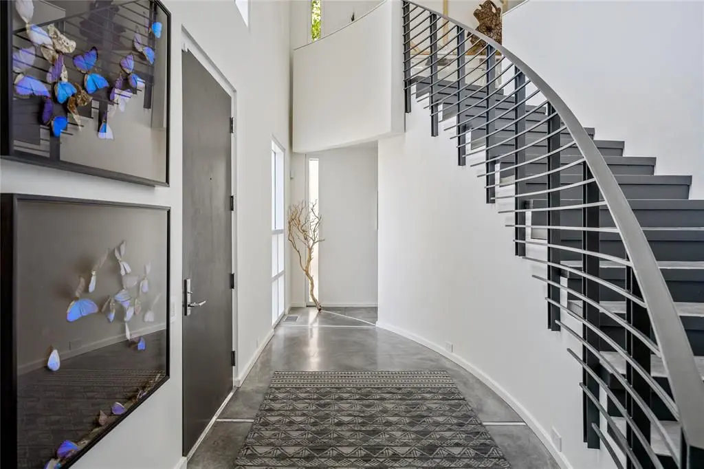 A streamlined stairwell. (Photo by Briggs Freeman Sotheby's)