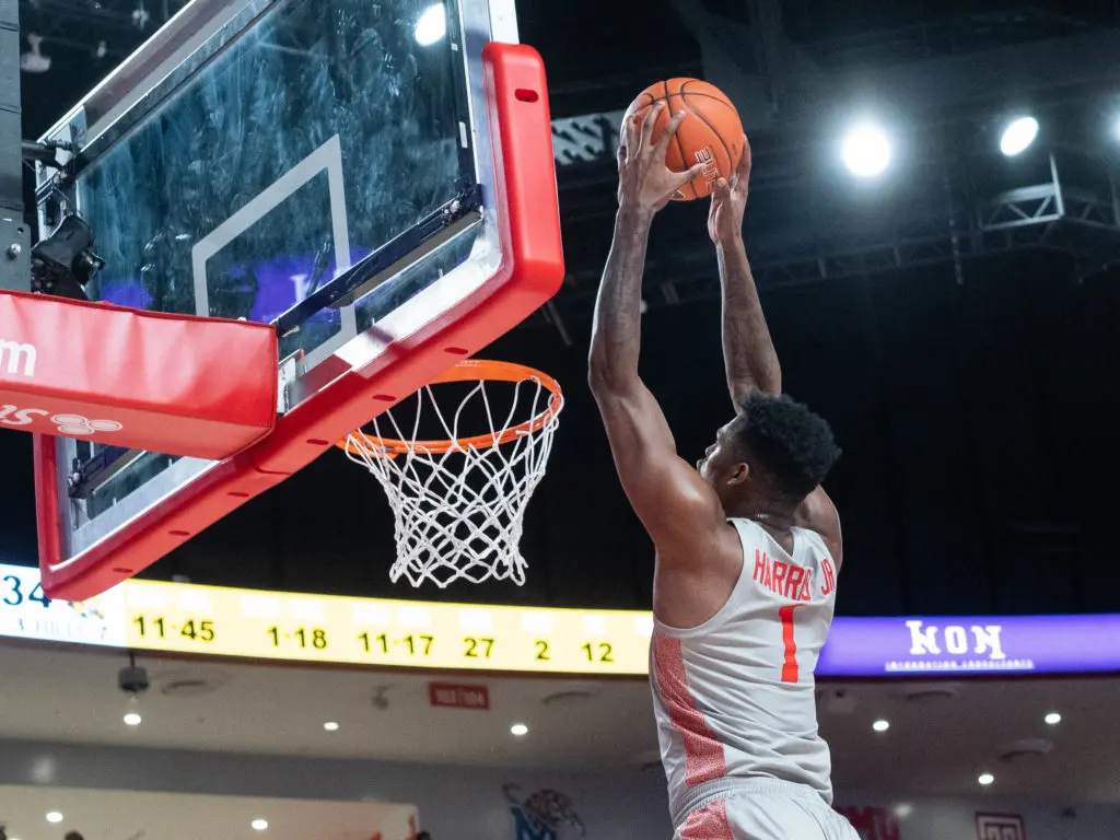 Chris Harris Jr. soars for an alley-oop slam. (Photo by F. Carter Smith)
