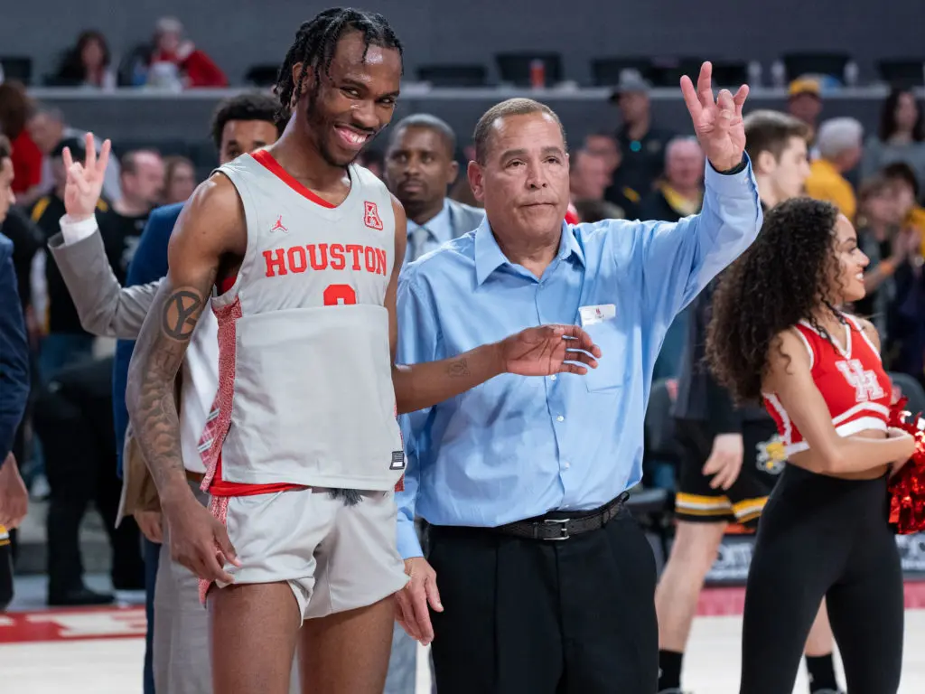 DeJon Jarreau and Kelvin Sampson share a moment during last season. (Photo by F. Carter Smith)