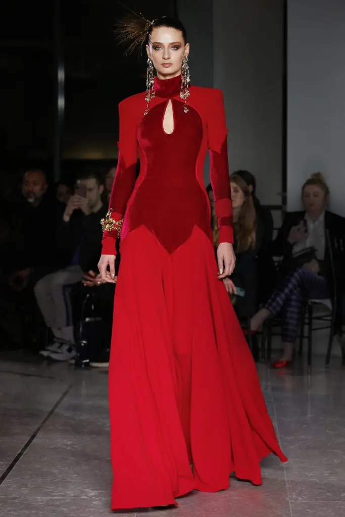 Naeem Khan two-toned red high-neck gown. (Photo by Dan and Corina Lecca)
