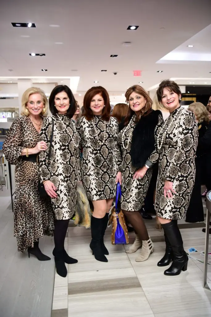 The cat's meow for these friends dressing in matching python print frocks. (Photo by Daniel Ortiz)